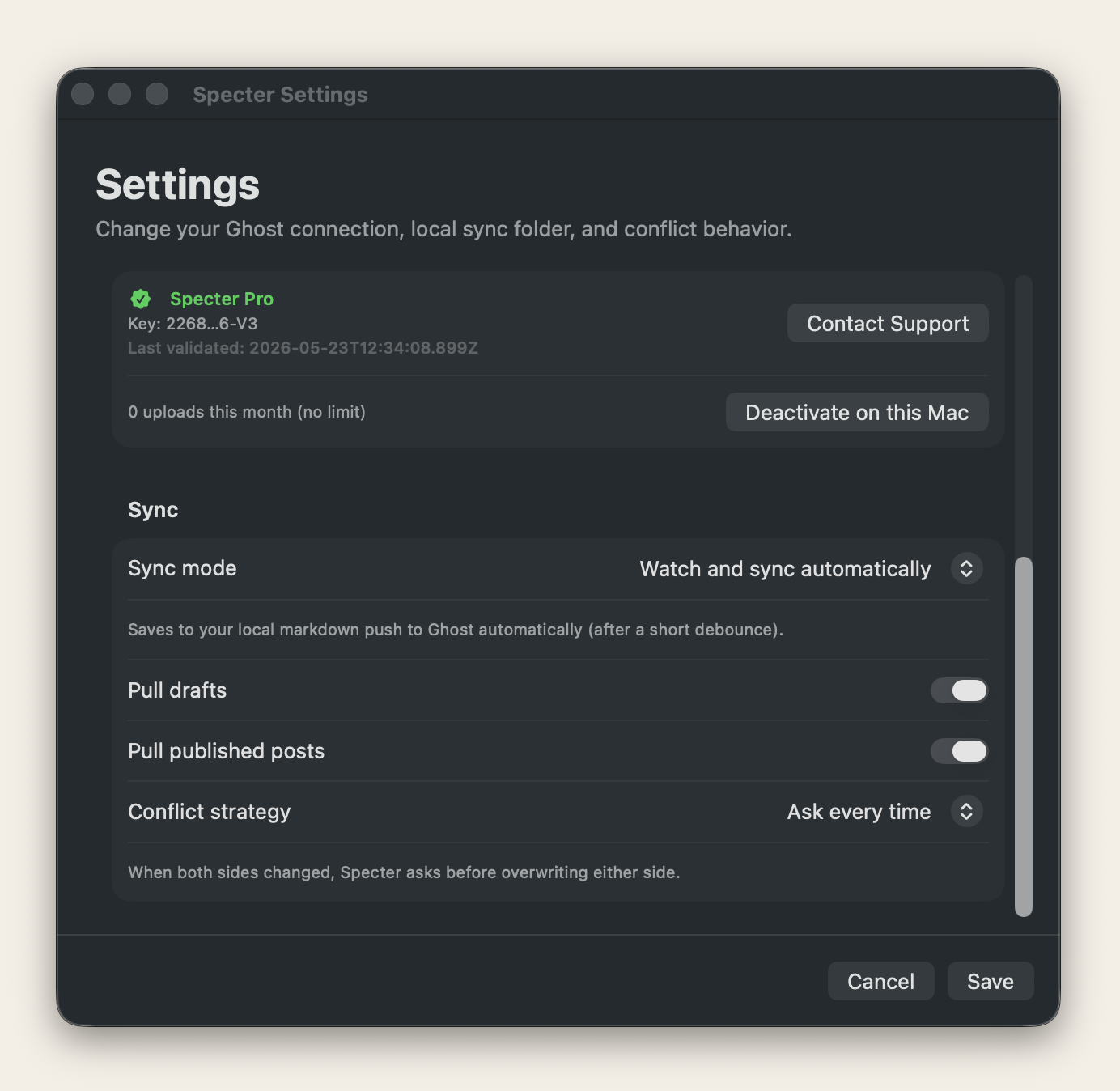 Specter settings window with an active Specter Pro license, sync mode set to watch-and-sync automatically, and conflict strategy set to ask every time